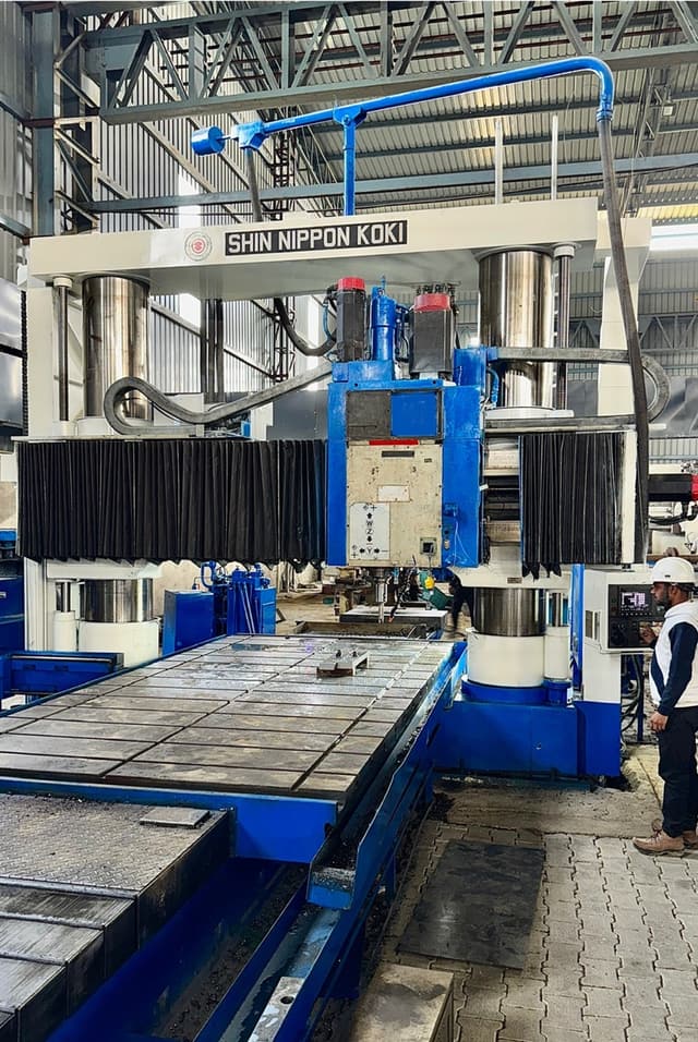The Shin Nippon Koki CNC planer-miller spanning its bed.